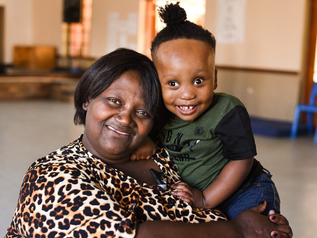 A woman and her grandson with a developmental disability